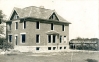 St. John Catholic Church Parsonage being constructed, postcard front
